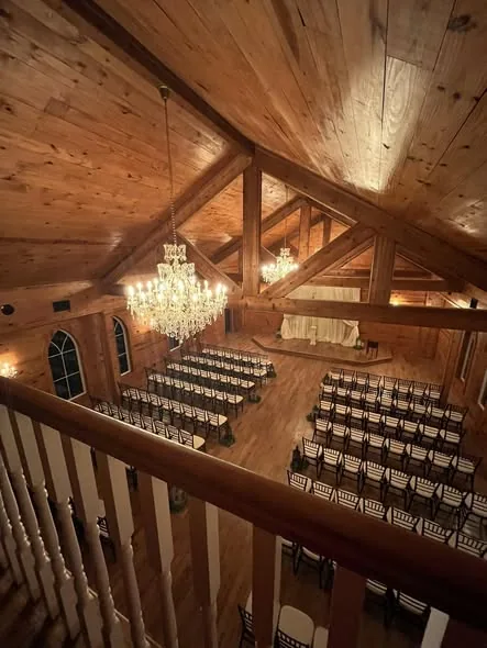 Cedar-walled White Chapel interior with crystal chandeliers